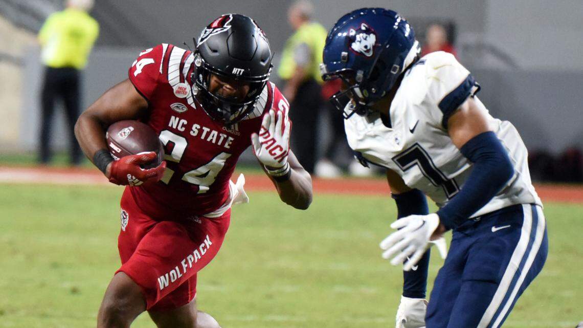 N.C. State’s Michael Allen (24) runs the ball during the Wolfpack’s game against the Connecticut Huskies at Carter-Finley Stadium in Sept. 2022.