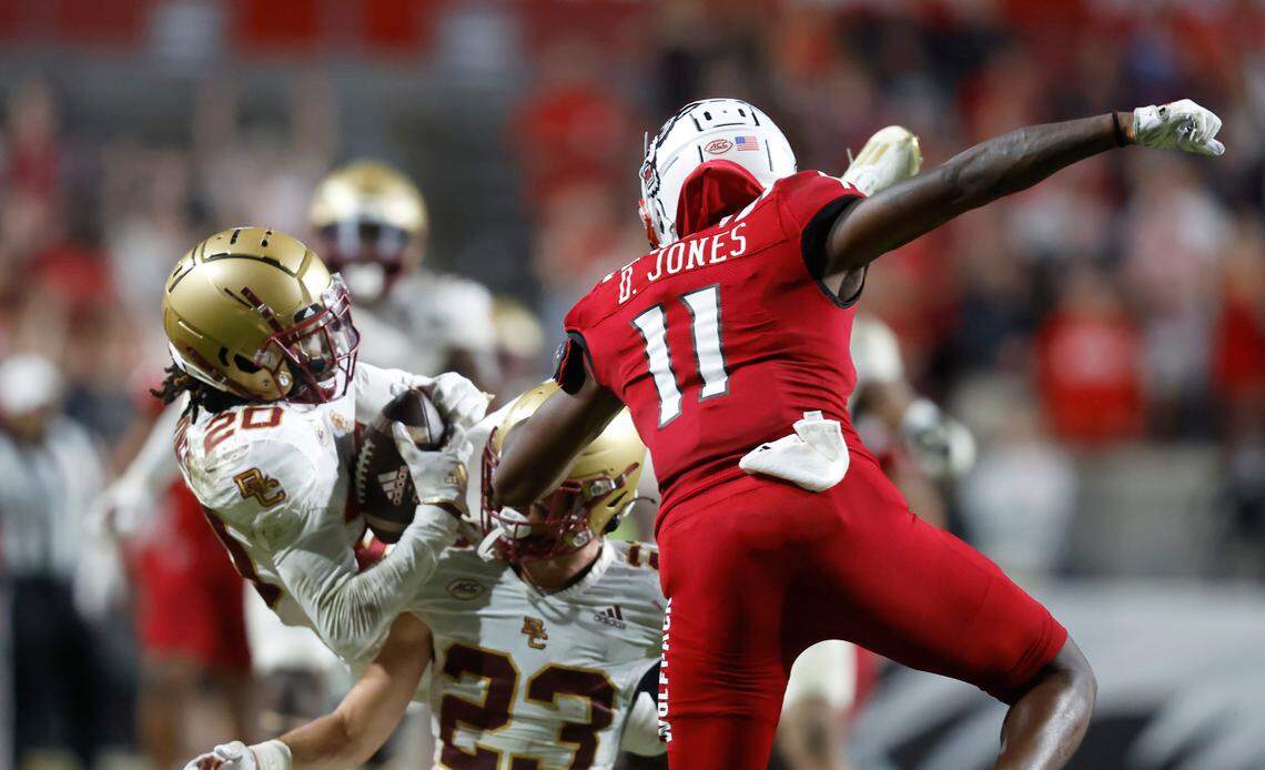 Boston College defensive back Elijah Jones (20) intercepts a pass intended for N.C. State wide receiver Darryl Jones (11) during the second half of Boston College’s 21-20 victory over N.C. State at Carter-Finley Stadium in Raleigh, N.C., Saturday, Nov. 12, 2022.