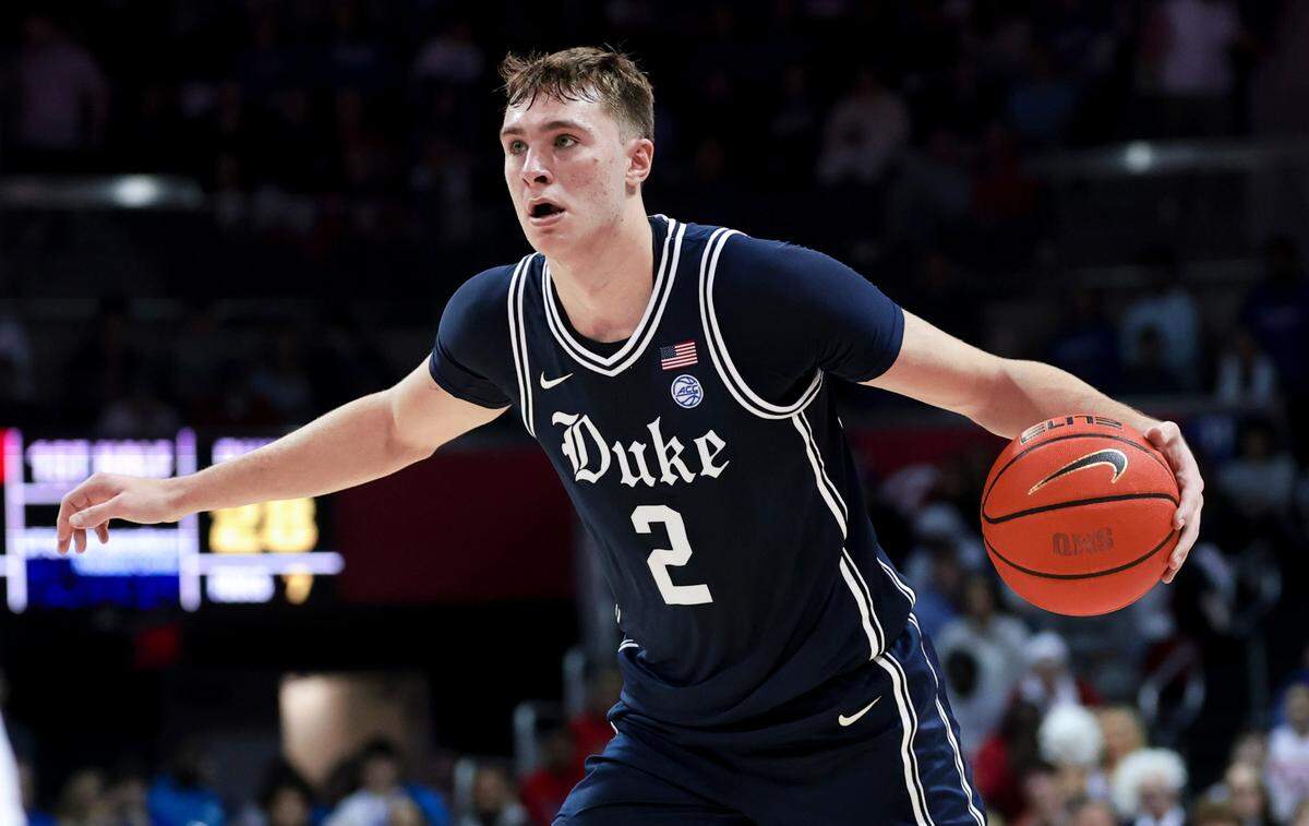 Jan 4, 2025; Dallas, Texas, USA; Duke Blue Devils guard Cooper Flagg (2) controls the ball during the first half against the Southern Methodist Mustangs at Moody Coliseum. Mandatory Credit: Kevin Jairaj-Imagn Images