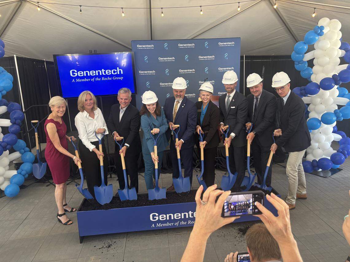 North Carolina elected officials, economic leaders and Roche executives pose for a photo op at the groundbreaking ceremony of Genentech’s planned weight-loss drug plant in Holly Springs in August 2025.