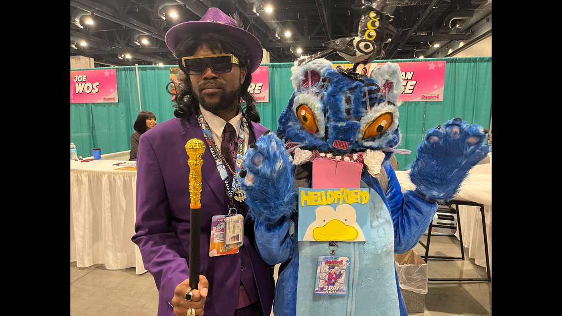 Terrence Johnson (left) and Montaya Chandler (right) at Animate! Raleigh Saturday, cosplaying as A Pimp Named Slickback from “The Boondocks” and Derpy from “KPop Demon Hunters” respectively.