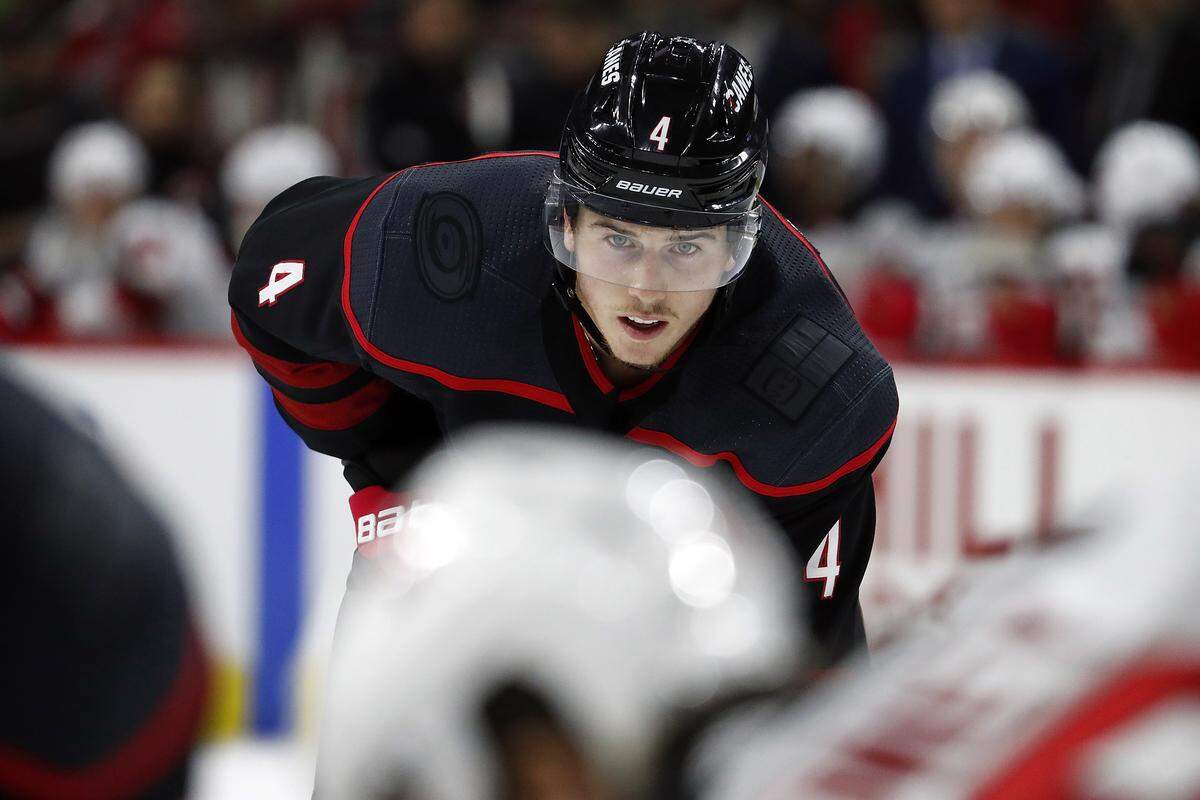 Carolina Hurricanes’ Haydn Fleury (4) waits for a face-off against the New Jersey Devils during the second period of an NHL hockey game in Raleigh, N.C., Friday, Feb. 14, 2020. (AP Photo/Karl B DeBlaker)