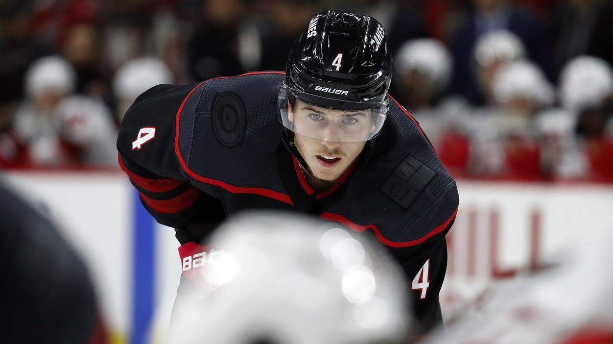 Carolina Hurricanes’ Haydn Fleury (4) waits for a face-off against the New Jersey Devils during the second period of an NHL hockey game in Raleigh, N.C., Friday, Feb. 14, 2020. (AP Photo/Karl B DeBlaker)