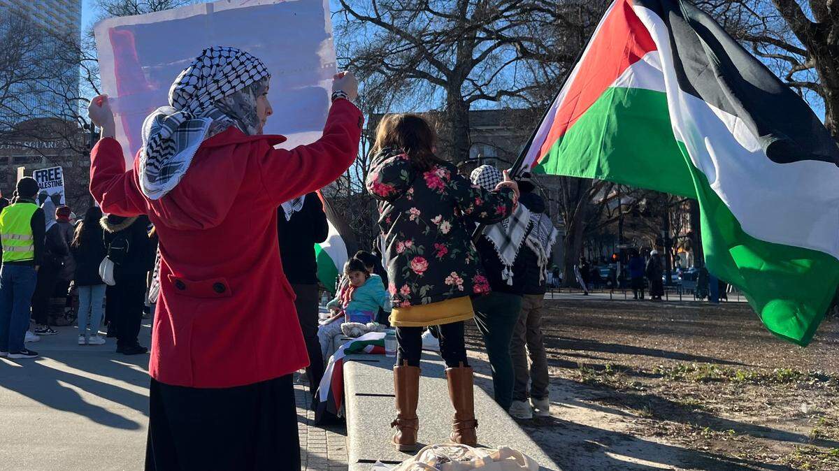 Defying cold, demonstrators again protest Israel-Hamas war in downtown Raleigh