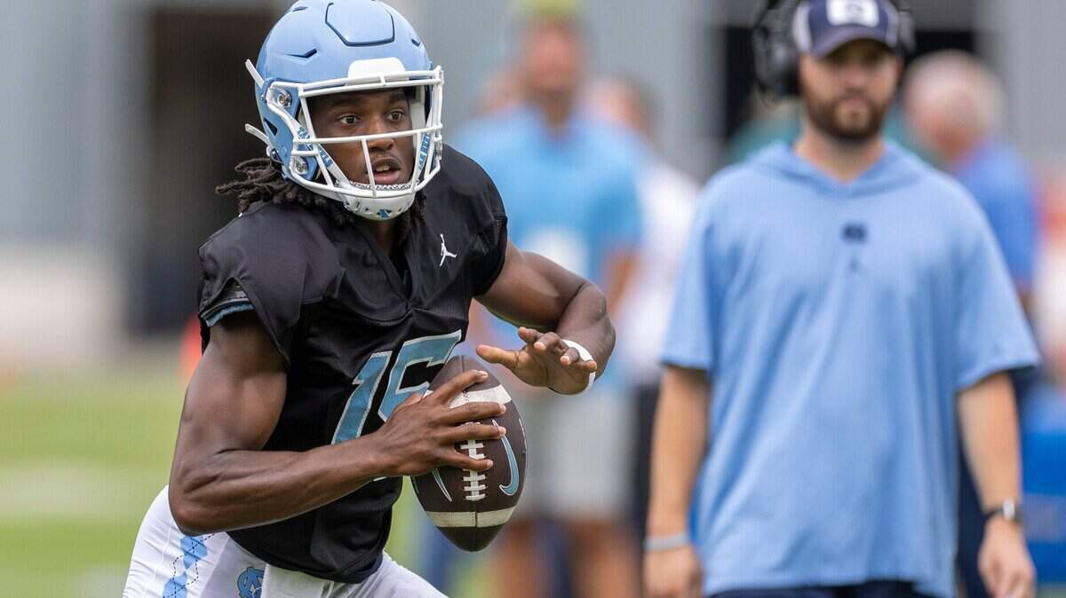 North Carolina quarterback Conner Harrell (15) looks for an open receiver during practice on Tuesday, August 6, 2024 in Chapel Hill, N.C.
