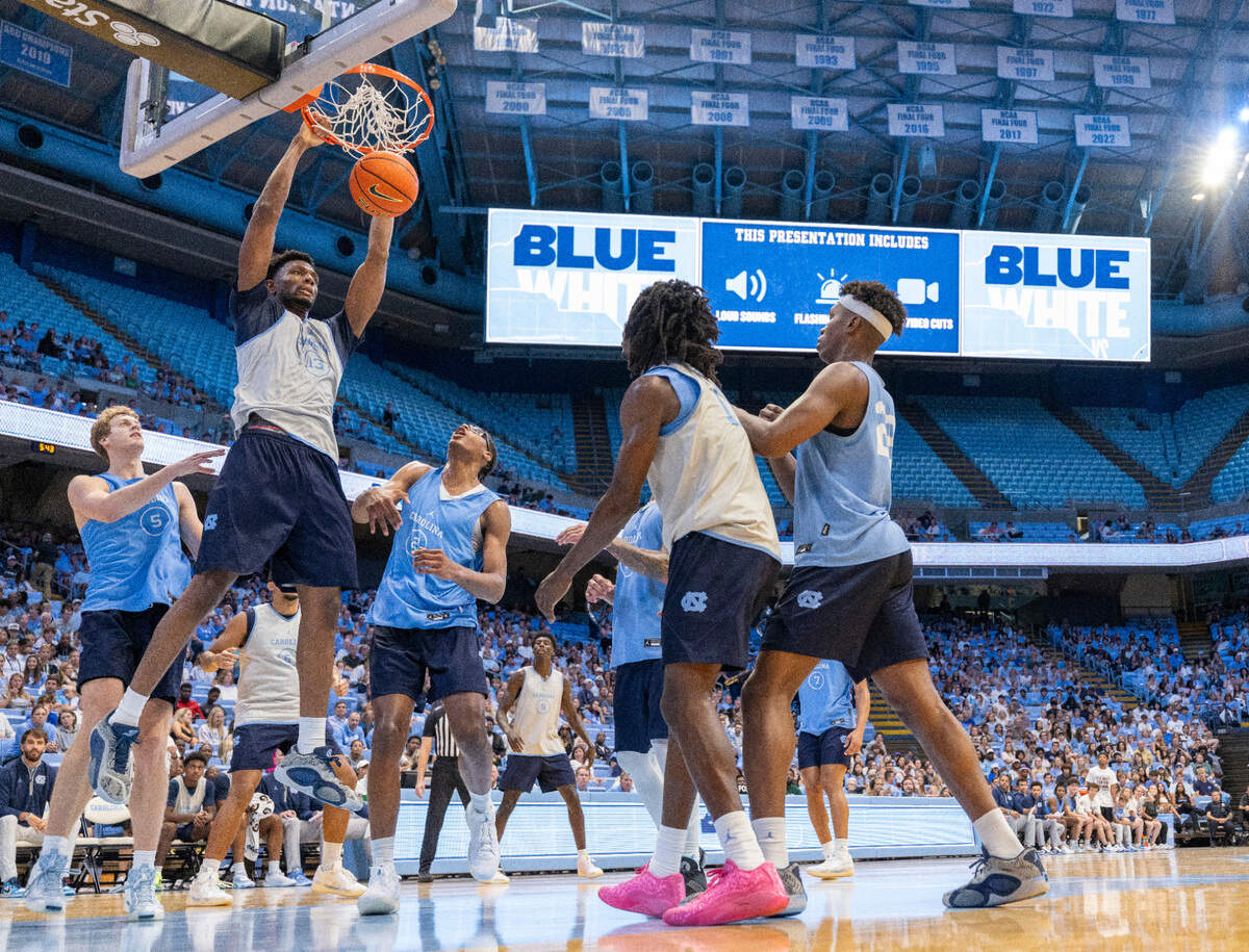 North Carolina forward Jalen Washington (13) gets a dunk in the second half during the Tar Heels’ Blue vs. White scrimmage on Saturday, October 12, 2024 at the Smith Center in Chapel Hill, N.C.