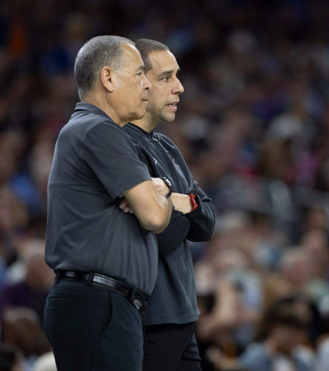 Houston coach Kelvin Sampson and his son Kellen Sampson watch the second half of the CougarsÕ game against Duke on Saturday, April 5, 2025 during the NCAA national semi final game at the Alamodome in San Antonio, TX.