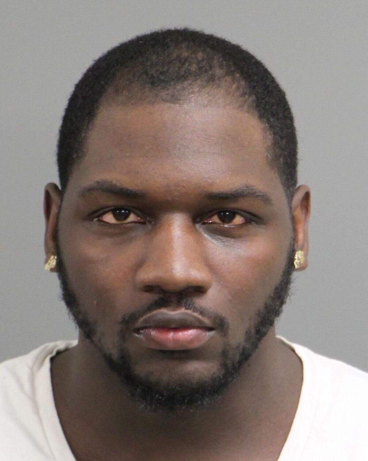 Roderick Howell testified as a hostile witness in the federal murder and conspiracy trial against two accused Bloods gang members in Raleigh. Three federal marshals had to wrestle him to the stand.