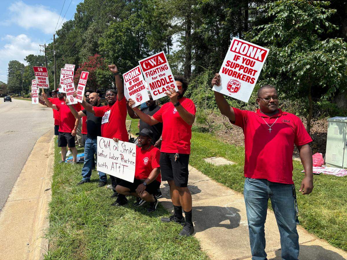 AT&T workers from CWA LOCAL 3611 picket in Morrisville on Aug. 17, 2024. They have joined thousands of colleagues across the southeastern United States in a strike over what they say is bad faith bargaining efforts from the telecommunications company.