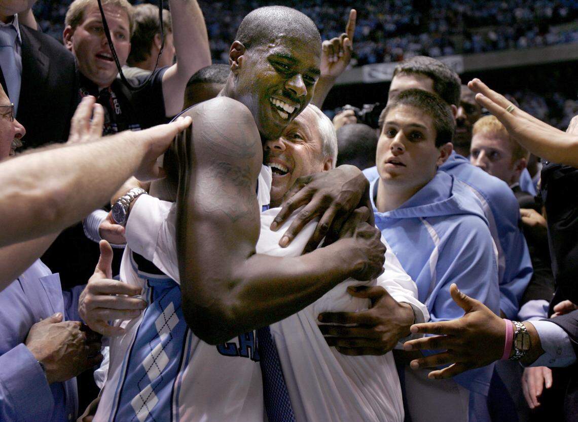 Now-Charlotte Hornet Marvin Williams (hugging North Carolina coach Roy Williams) is back in Chapel Hill this week for training camp.