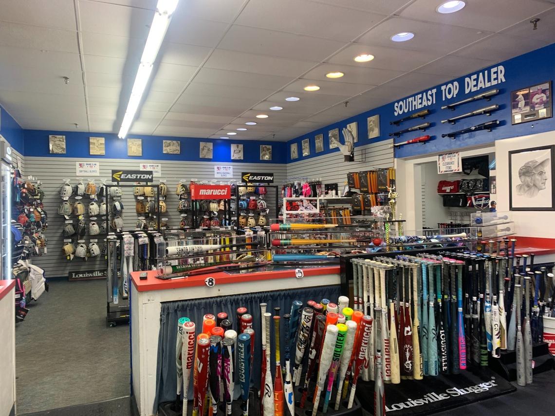 Inside Grand Slam USA’s retail shop at its former location on Western Boulevard, customers could find all kinds of baseball and softball equipment, including bats and gloves.