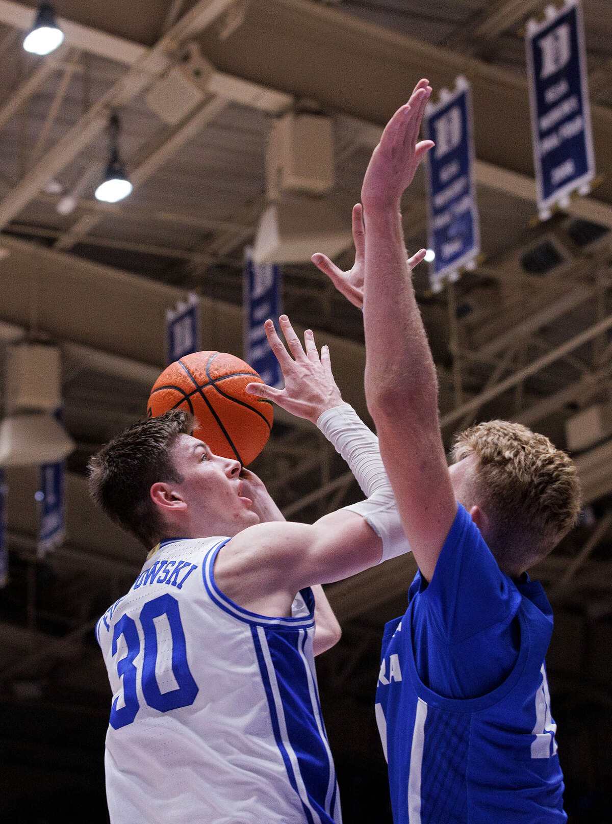 Duke’s Kyle Filipowski shoots over Hofstra’s Jacco Fritz during the second half of the Blue Devils’ 89-68 win on Tuesday, Dec. 12, 2023, at Cameron Indoor Stadium in Durham, N.C.