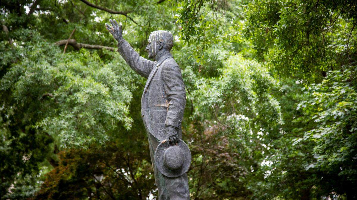 A statue of Josephus Daniels, former owner and editor of The News & Observer and Secretary of the Navy, stands on Nash Square across the street from the former News & Observer building in downtown Raleigh Friday, May 8, 2020. A former North Carolina representative wants historical context about a racist government coup to be added to the Josephus Daniels statue in downtown Raleigh.