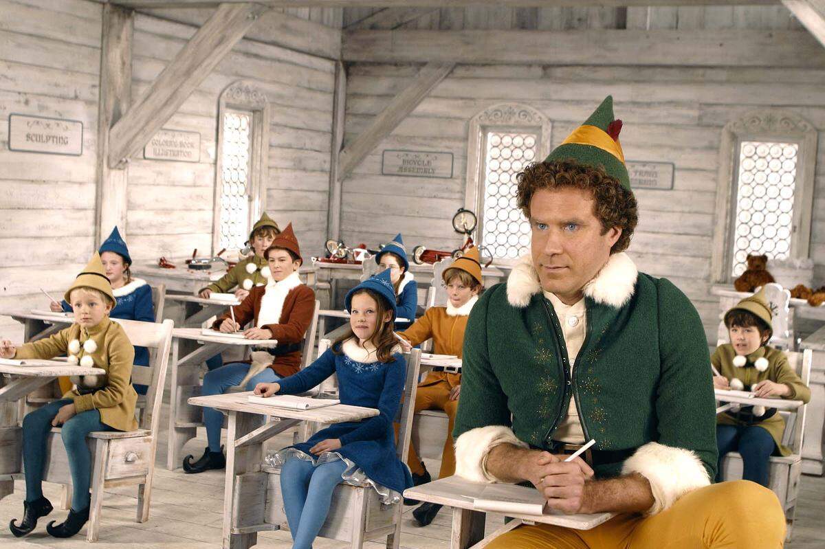 Will Ferrell (right) stars as Buddy the Elf in New Line Cinemas “ Elf. “ (AP Photo/ Alan Markfield/New Line Productions )