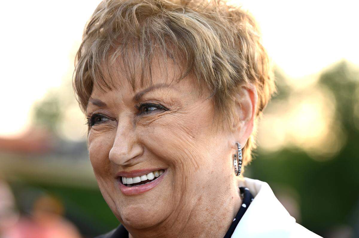 Terri Parsons, wife of former NASCAR driver Benny Parsons smiles after the Benny Parsons Grandstand was unveiled at North Wilkesboro Speedway on Wednesday, May 10, 2023. North Wilkesboro Speedway held an open house for fans to see the renovations to the track. The speedway will host the NASCAR All-Star race on Sunday, May 21, 2023. The last race ran at the speedway was in 1996.
