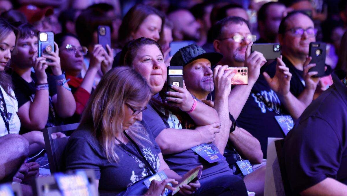 Fans record as cast members from Daredevil speak at GalaxyCon in Raleigh, N.C., Saturday, July 27, 2024.