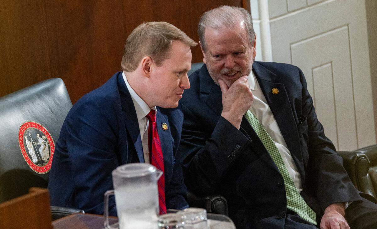 Republican House Speaker Destin Hall, left, and Republican Senate President Pro Tempore Phil Berger, talk before Democratic Gov. Josh Stein delivered his State of the State address to a joint session of the General Assembly on Wednesday, March 12, 2025, in the House chamber of the Legislative Building.