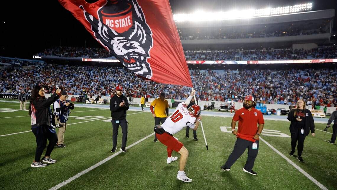 NC State football left proudly waving, planting the flag after beating No. 18 Tar Heels