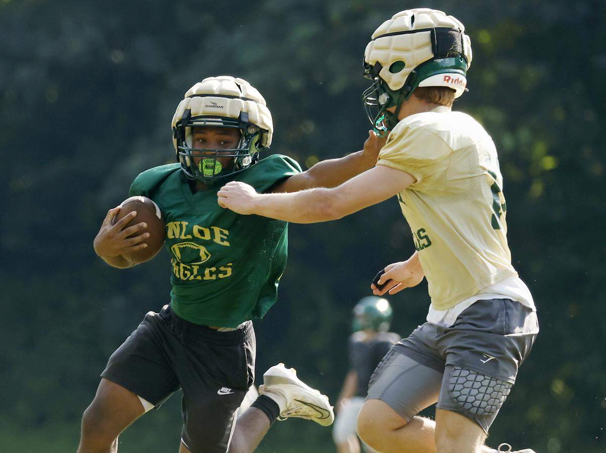 Enloe High School sophomore TJ Harris runs the ball during practice on Monday, Aug. 18, 2025, in Raleigh, N.C.