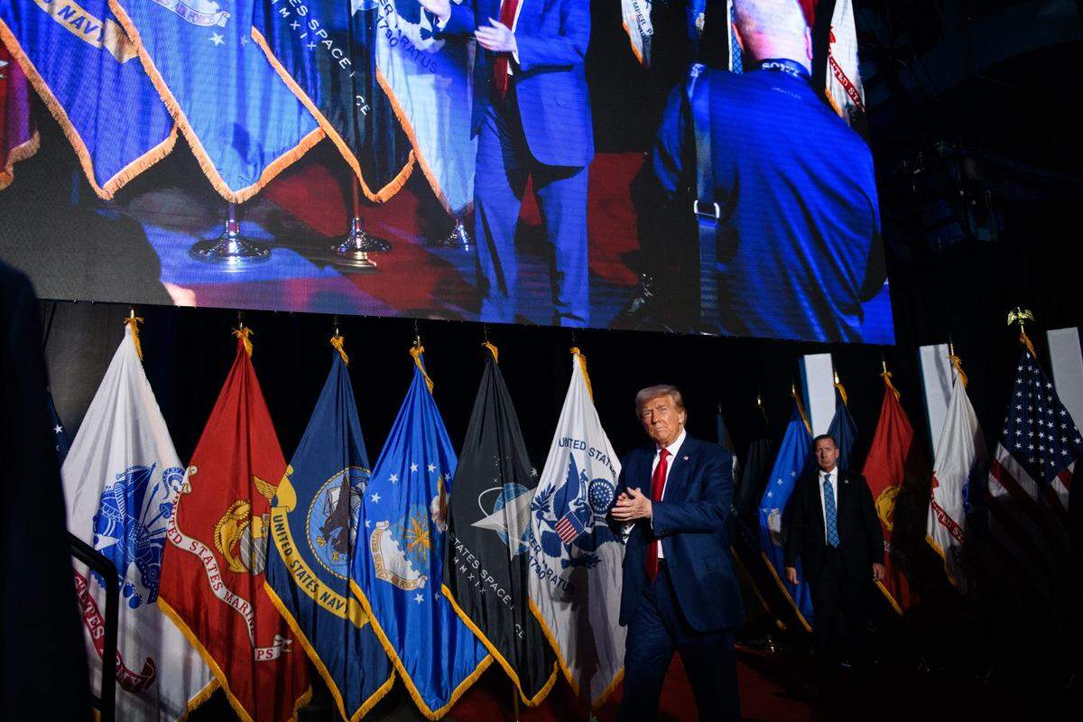 Republican presidential nominee and former U.S. President Donald Trump walks to the stage at a town hall event at the Crown Arena on Friday, October. 4, 2024.
