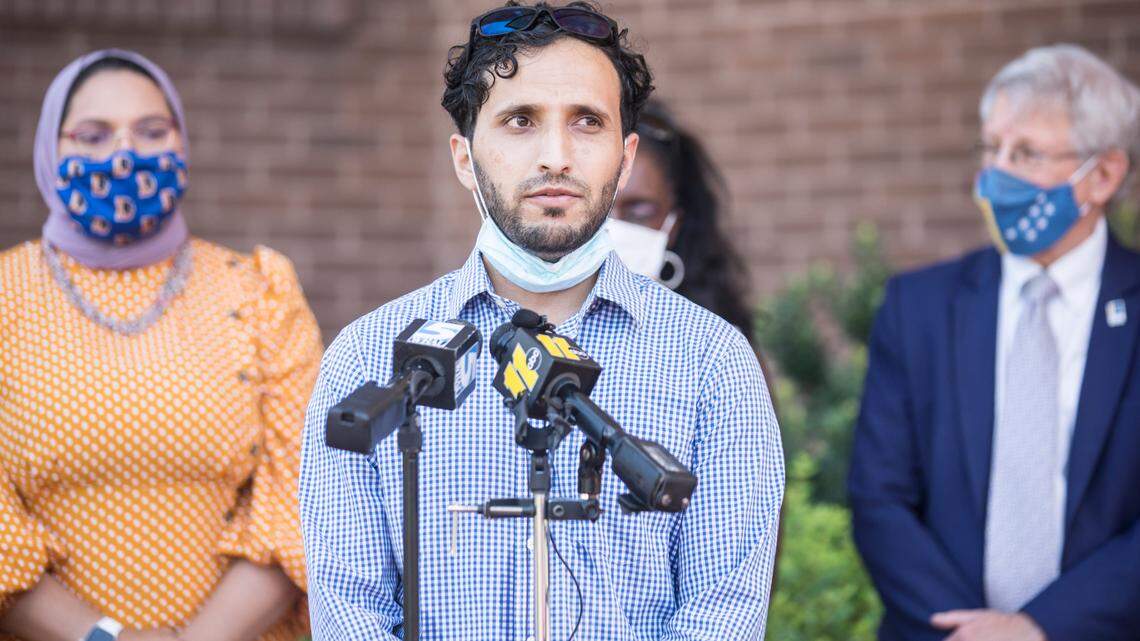 Omid Ahmadzai, a refugee from Afghanistan who arrived in Durham in 2015 on a Special Immigrant Visa (SIV), speaks about on-going refugee resettlement efforts in Durham at a press conference outside City Hall in Durham, N.C. on Monday, Aug. 30, 2021.