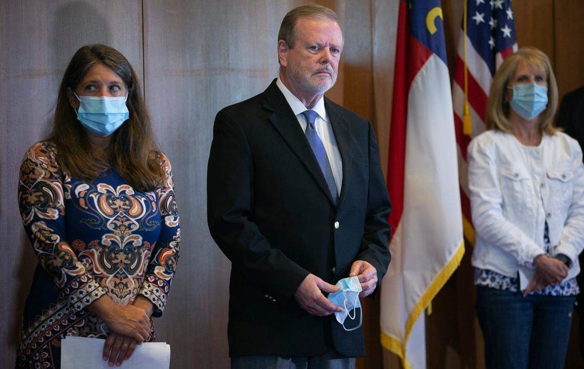 Sen. Phil Berger, flanked by Michele Morrow, left and Dr. Tracy Taylor, right, during a press conference at the General Assembly on Wednesday, September 16, 2020 in Raleigh, N.C., where GOP leaders called for the immediate reopening of the North Carolina schools for in-person learning.