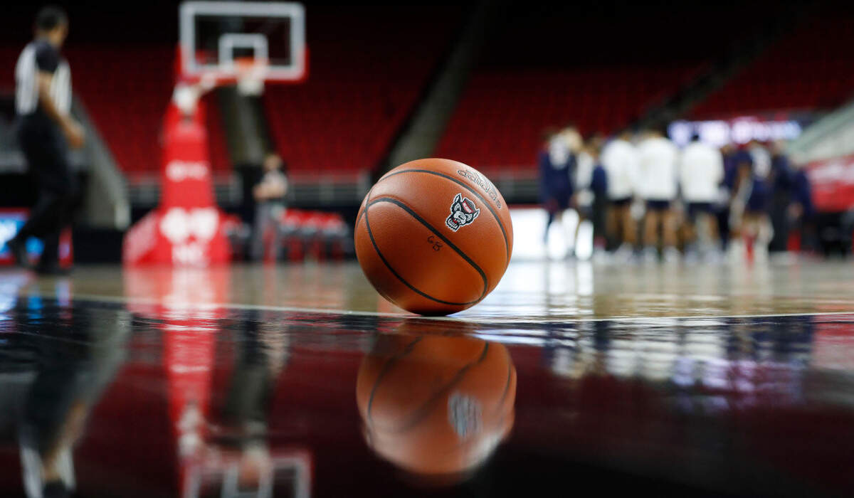 A basketball sits on the court during a timeout in the second half of Virginia’s 64-57 victory over N.C. State at PNC Arena in Raleigh, N.C., Wednesday, February 3, 2021.
