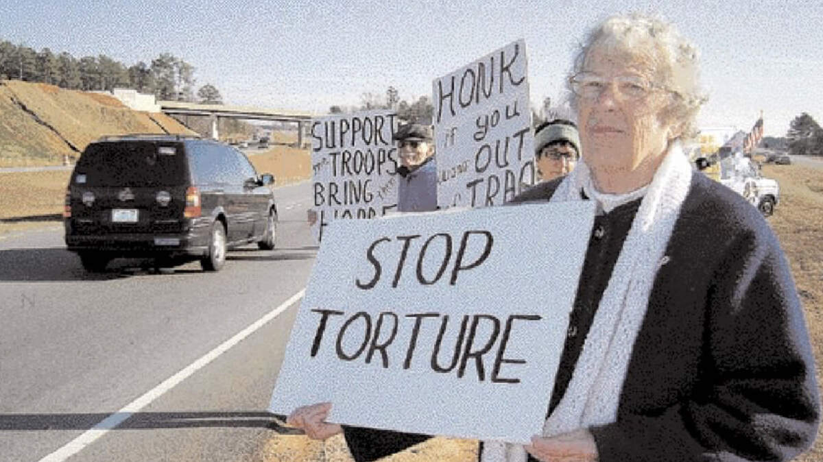 Jane Hunt, photographed during a protest, appeared in the Dec. 13, 2005, edition of The Herald.