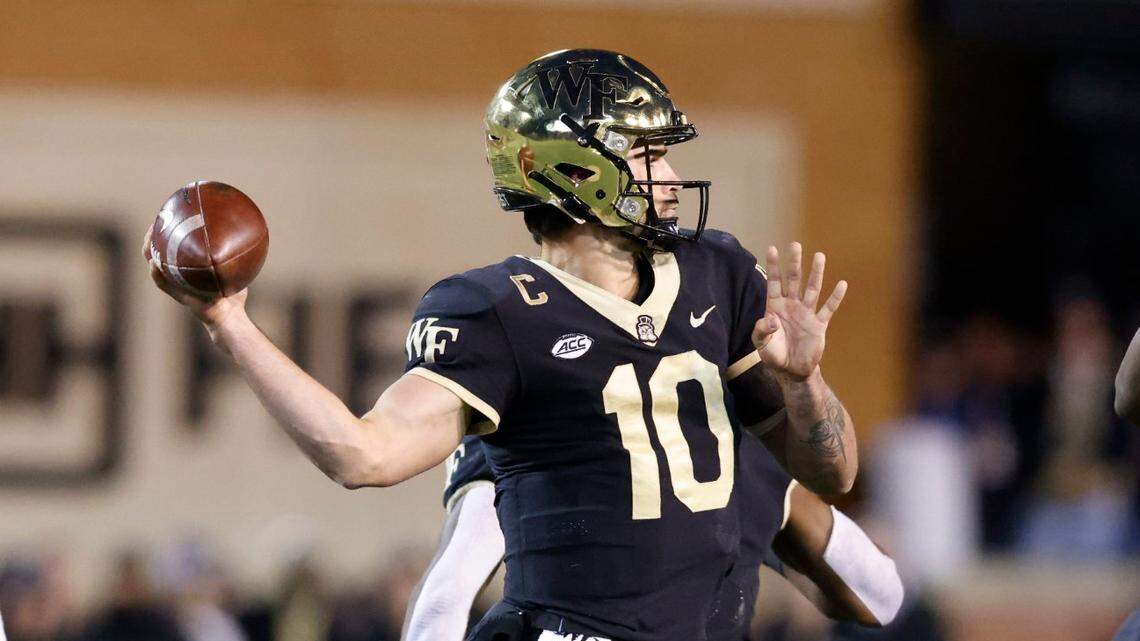 Wake Forest quarterback Sam Hartman (10) prepares to pass during the first half of N.C. States game against Wake Forest at Truist Field in Winston-Salem, N.C., Saturday, November 13, 2021.