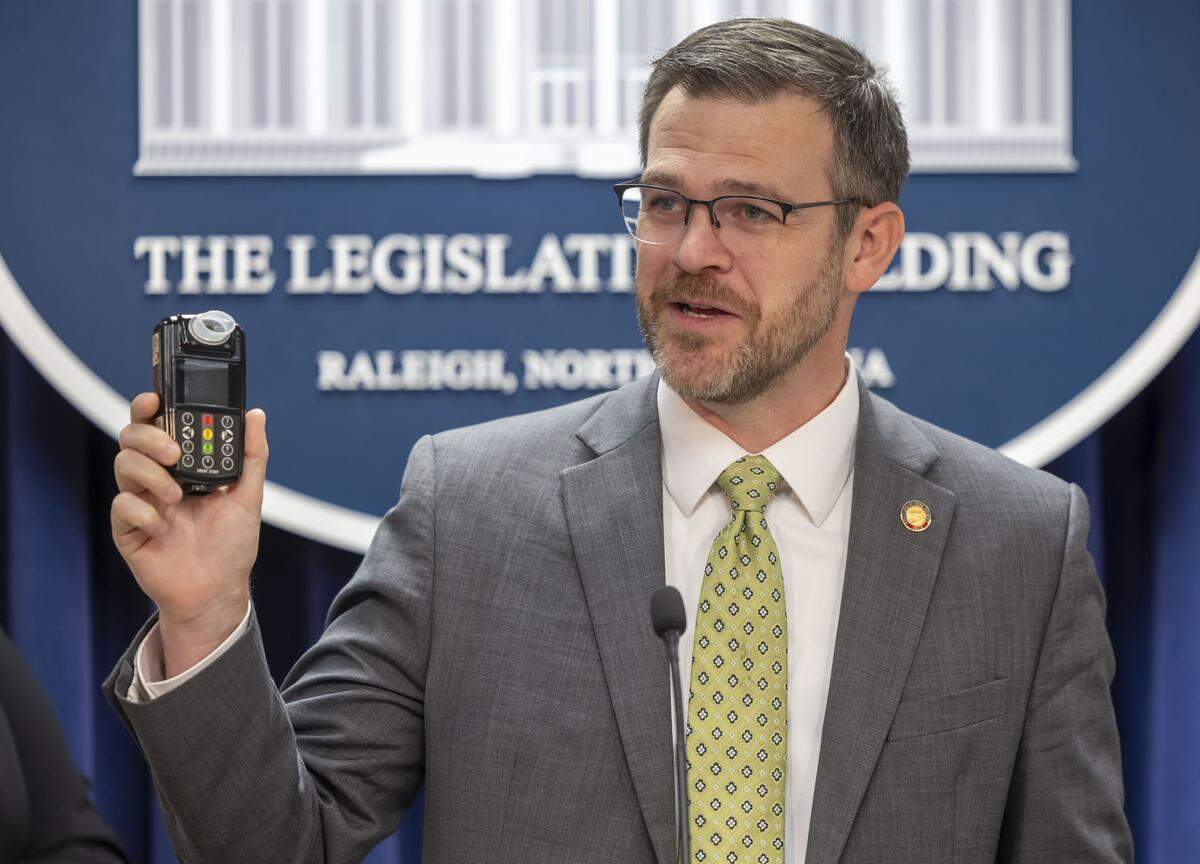 Rep. Mike Schietzelt, touts the benefit of the Ingnition Interlock Device, during a press briefing on Wednesday, May 13, 2026 at the General Assembly in Raleigh, N.C.  Schietzelt is sponsoring HB 1199, legislation that will close loopholes in the current ignition interlock law helping to curb rising alcohol related crashes. 