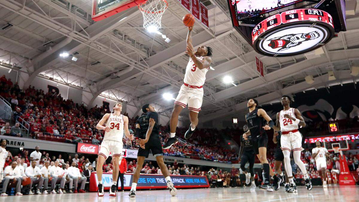 N.C. State’s MJ Rice (3) heads to slam in two during N.C. State’s 93-61 victory over Maryland Eastern Shore at Reynolds Coliseum in Raleigh, N.C., Wednesday, Dec. 6, 2023.