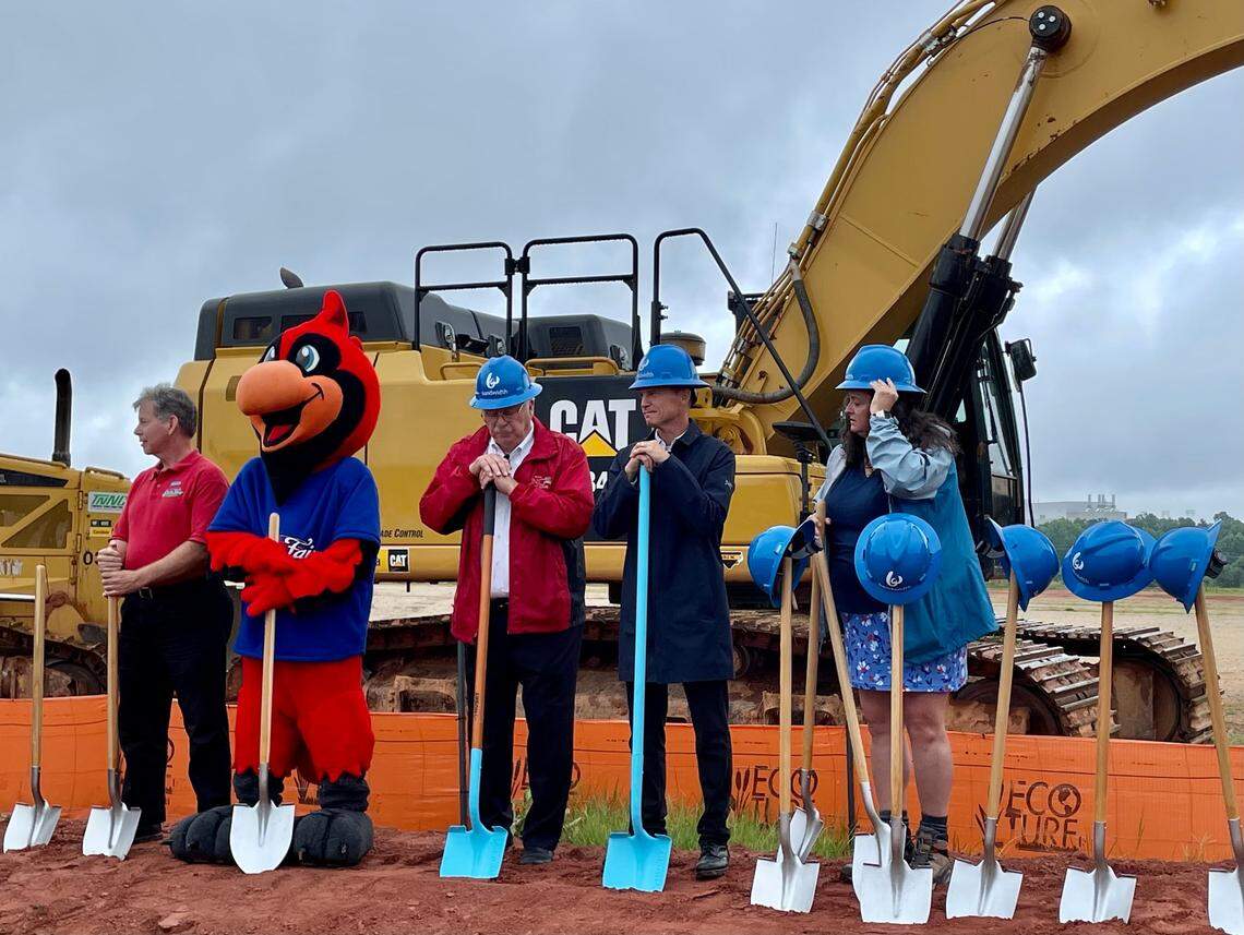 Bandwidth CEO David Morken, second from right, breaks ground on his company’s new headquarters in Raleigh on July 19, 2021. 