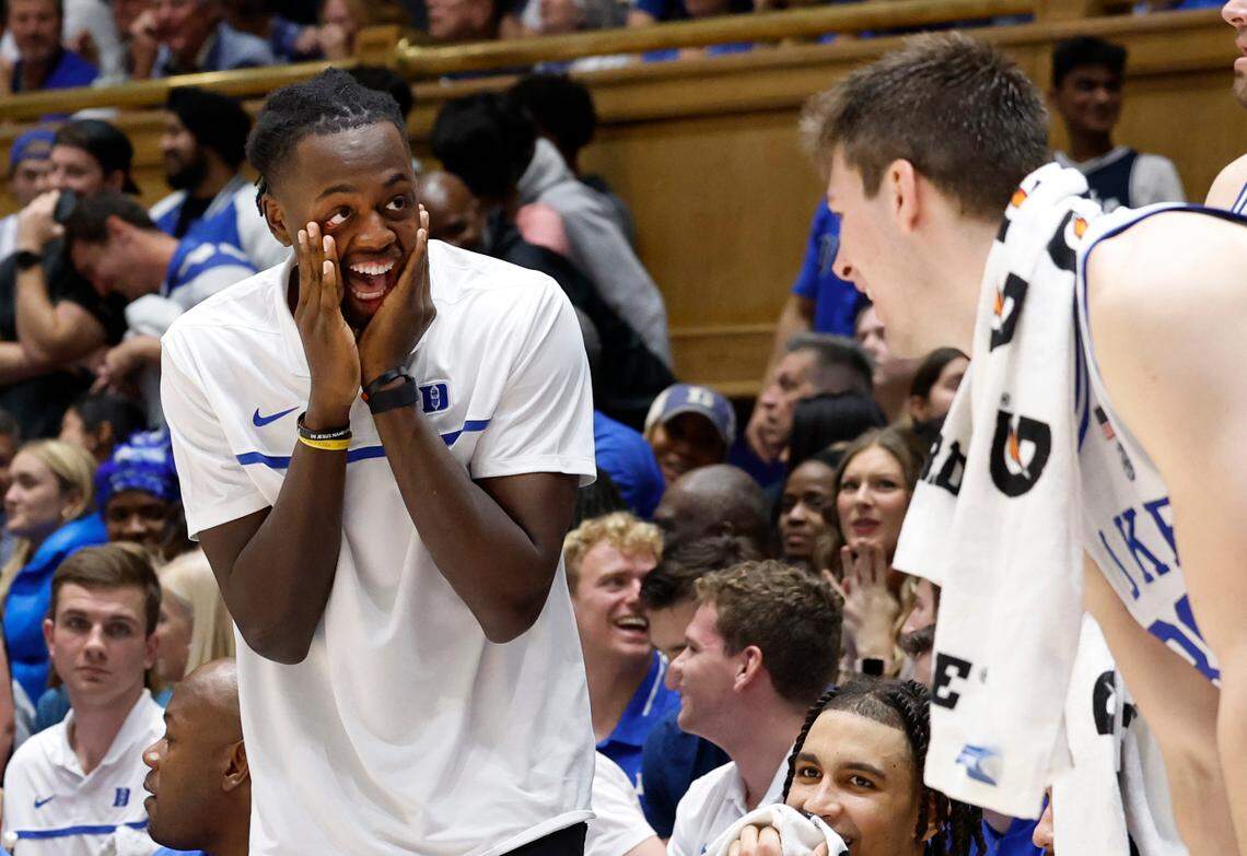 Duke’s Mark Mitchell, left, reacts with Kyle Filipowski (30) after Sean Stewart pulled up on a dunk during the second half of Duke’s 92-54 victory over Dartmouth at Cameron Indoor Stadium in Durham, N.C., Monday, Nov. 6, 2023.