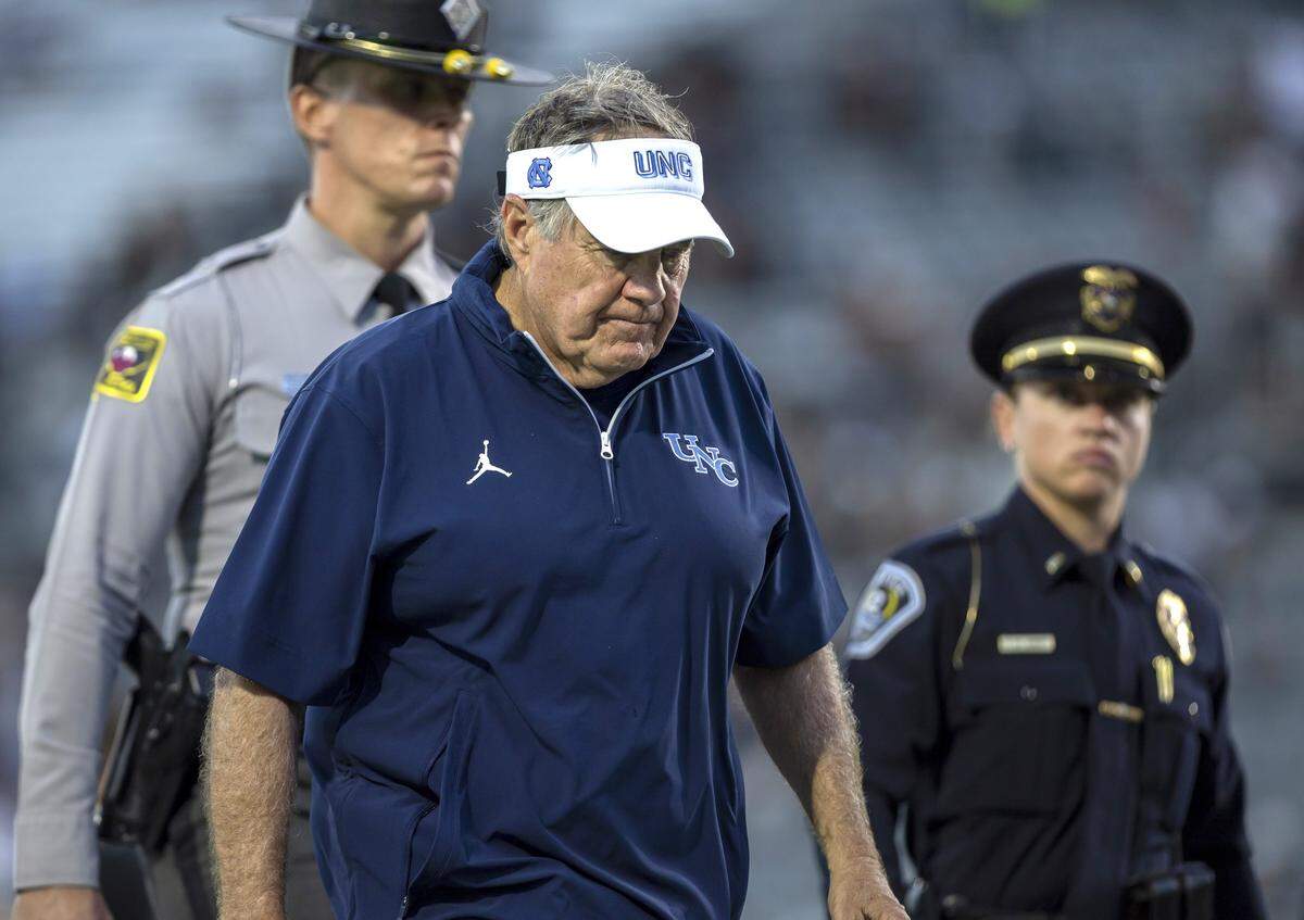 North Carolina coach Bill Belichick leaves the field following the Tar Heels’ 34-9 loss to UCF on Saturday, September 20, 2025 at Acrisure Bounce House Stadium in Orlando, Fla.