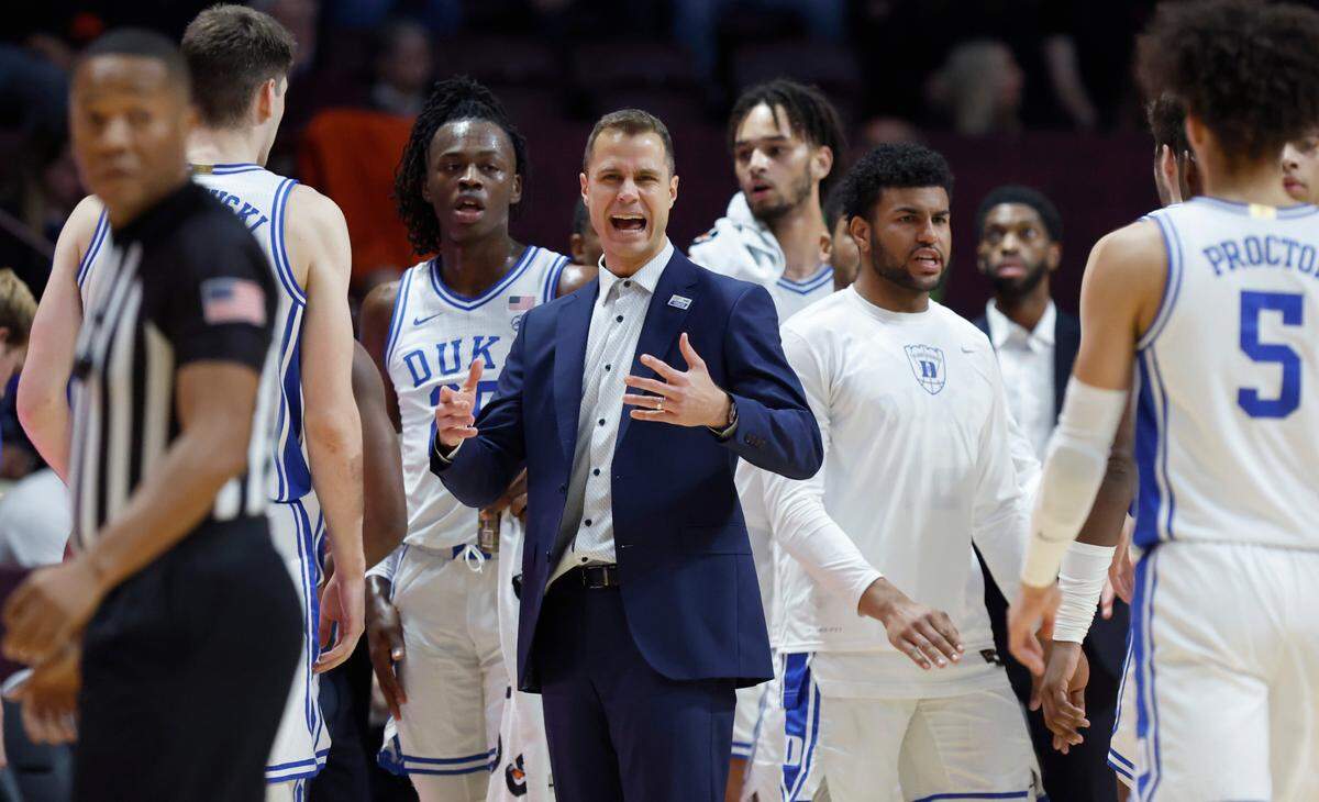 Duke head coach Jon Scheyer yells to his players during a timeout during the first half of Duke’s game against Virginia Tech at Cassell Coliseum in Blacksburg, VA., Monday, Jan. 23, 2023.