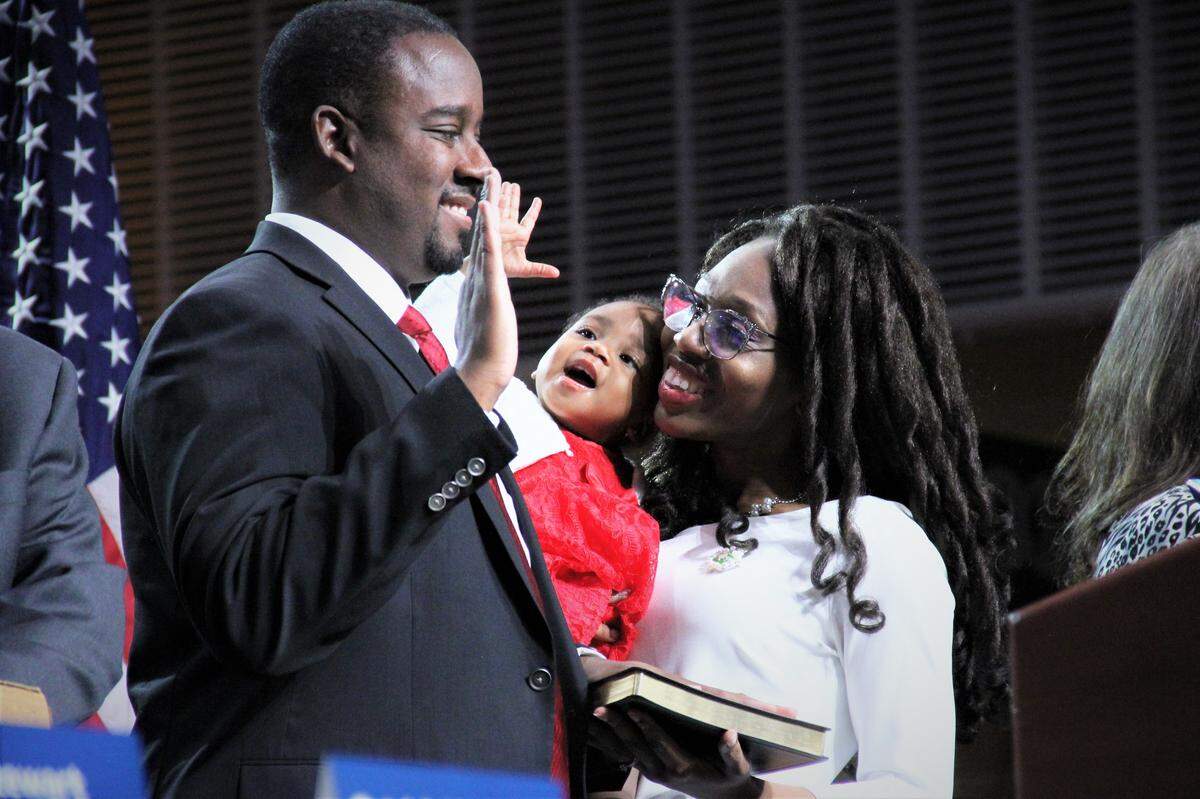 District C Raleigh City Council member Corey Branch with his wife, Chanda, and their first child Carleigh Ivy-Rose Branch celebrate at his swearing-in on Monday, Dec. 2, 2019, at Raleigh Union Station.