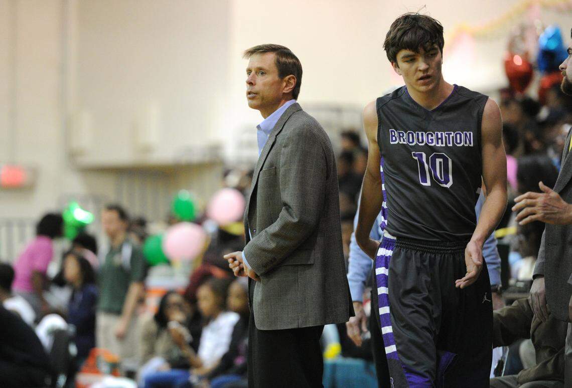 Broughton boys head coach Jeff Ferrell coaches his players during a game against Enloe High School in 2016.