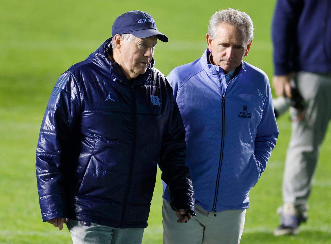 North Carolina head football coach Bill Belichick talks with athletic director Bubba Cunningham after UNC football’s Practice Like a Pro open practice at Kenan Stadium in Chapel Hill, N.C., Saturday, April 12, 2025.