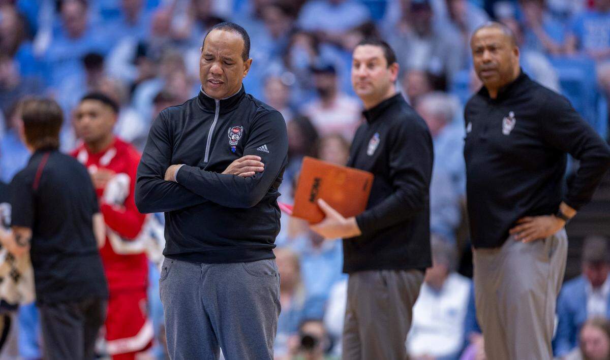 Down by ten points late in the second half to North Carolina, N.C. State coach Kevin Keatts reacts as Casey Morsell (14) fouls out of the game on Saturday, March 2, 2023 at the Smith Center in Chapel Hill, N.C.