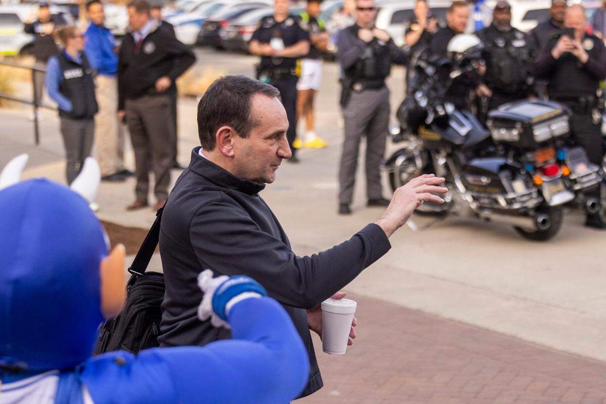 Duke head coach Mike Krzyzewski prepares to depart with his team for the Final Four in New Orleans Tuesday, March 29, 2022 outside Cameron Indoor Stadium.