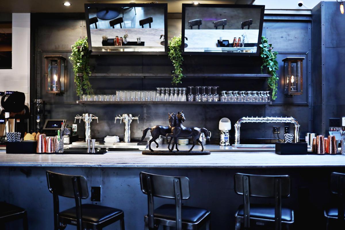 The bar at Katsuji’s new restaurant, High Horse, in downtown Raleigh’s historic City Market.