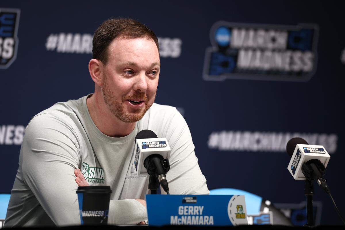 Head coach Gerry McNamara of the Siena Saints speaks with the media during practice day ahead of the first round of the 2026 NCAA Men's Basketball Tournament at Bon Secours Wellness Arena on March 18, 2026 in Greenville, South Carolina. 