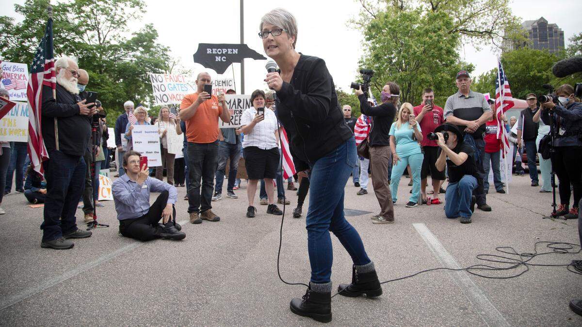 Becky Addison, a real estate investor from Cameron speaks during a ReOpen NC rallyTuesday, May 5, 2020 in downtown Raleigh, N.C.