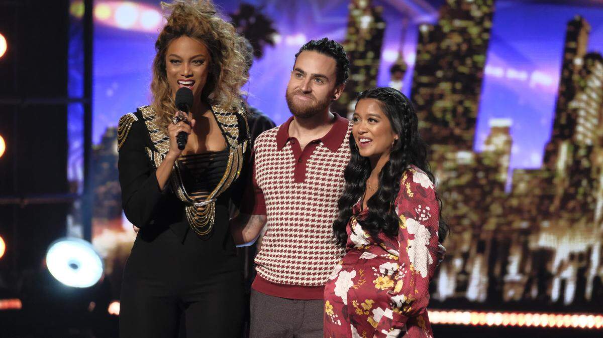 Tyra Banks, left, with Michael and Carissa Alvarado, also known as Us the Duo, on “America’s Got Talent.”