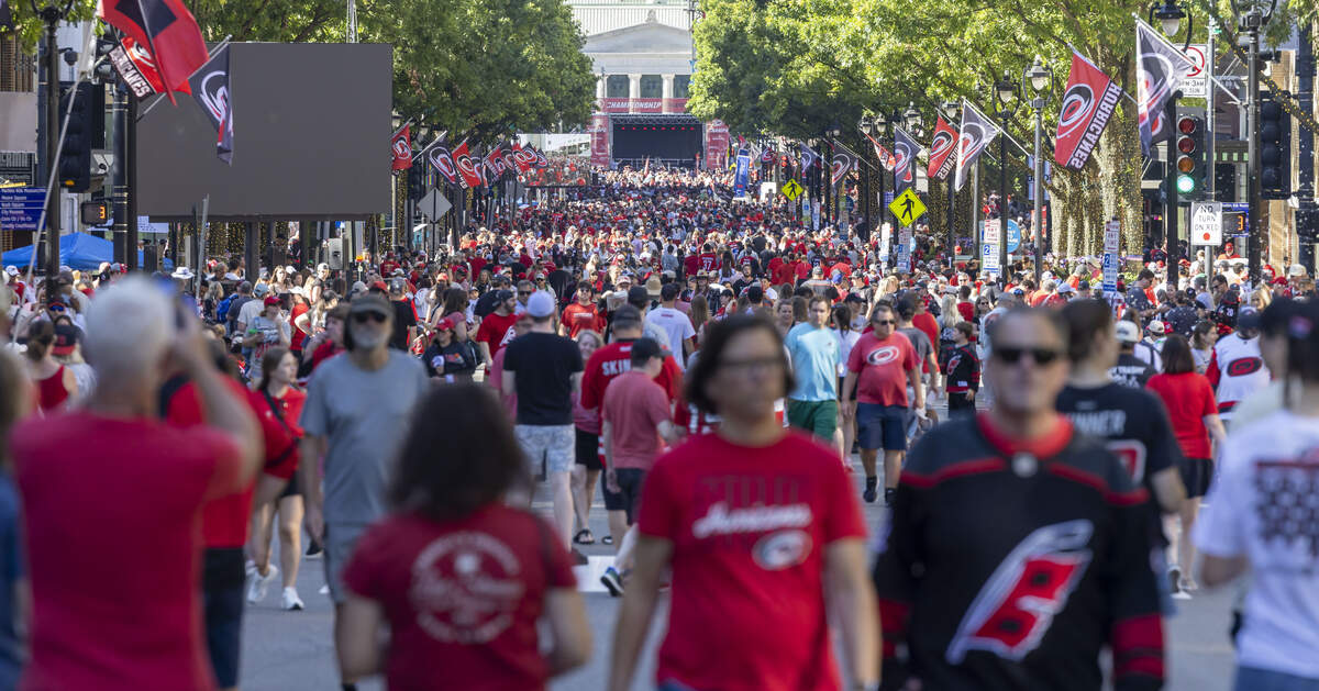 Fayetteville Street is flooded with Carolina Hurricanes fans, two hours before the start of their parade celebrating their Stanley Cup victory,  on Saturday, June 20, 2026 in Raleigh, NC.