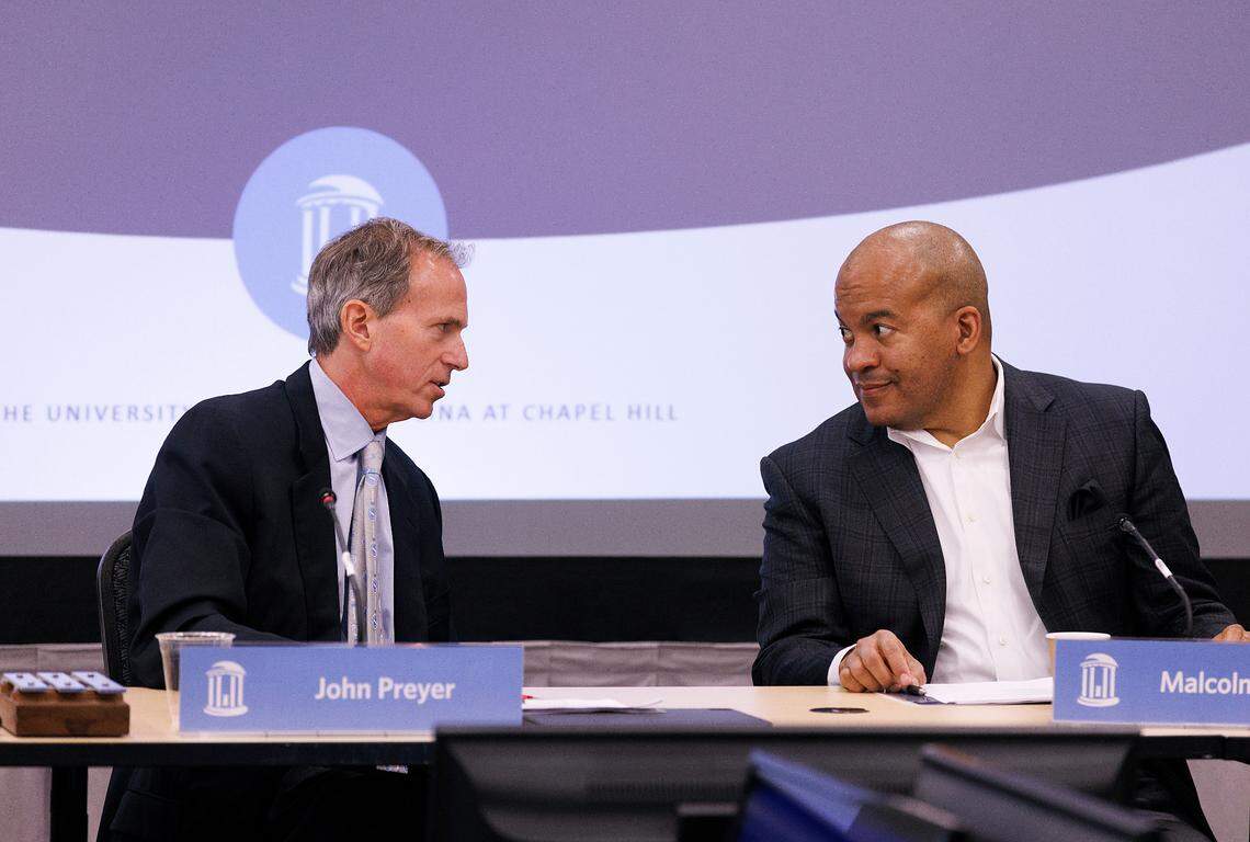 UNC Board of Trustees Chair John Preyer speaks with Vice Chair Malcolm Turner during a meeting in Chapel Hill, N.C. on Thursday, May 16, 2024.
