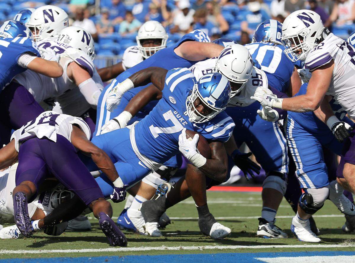 Duke’s Jordan Waters carries the ball into the end zone for a touchdown during the first half of the Blue Devils’ game against Northwestern on Saturday, Sept. 16, 2023, at Wallace Wade Stadium in Durham, N.C.