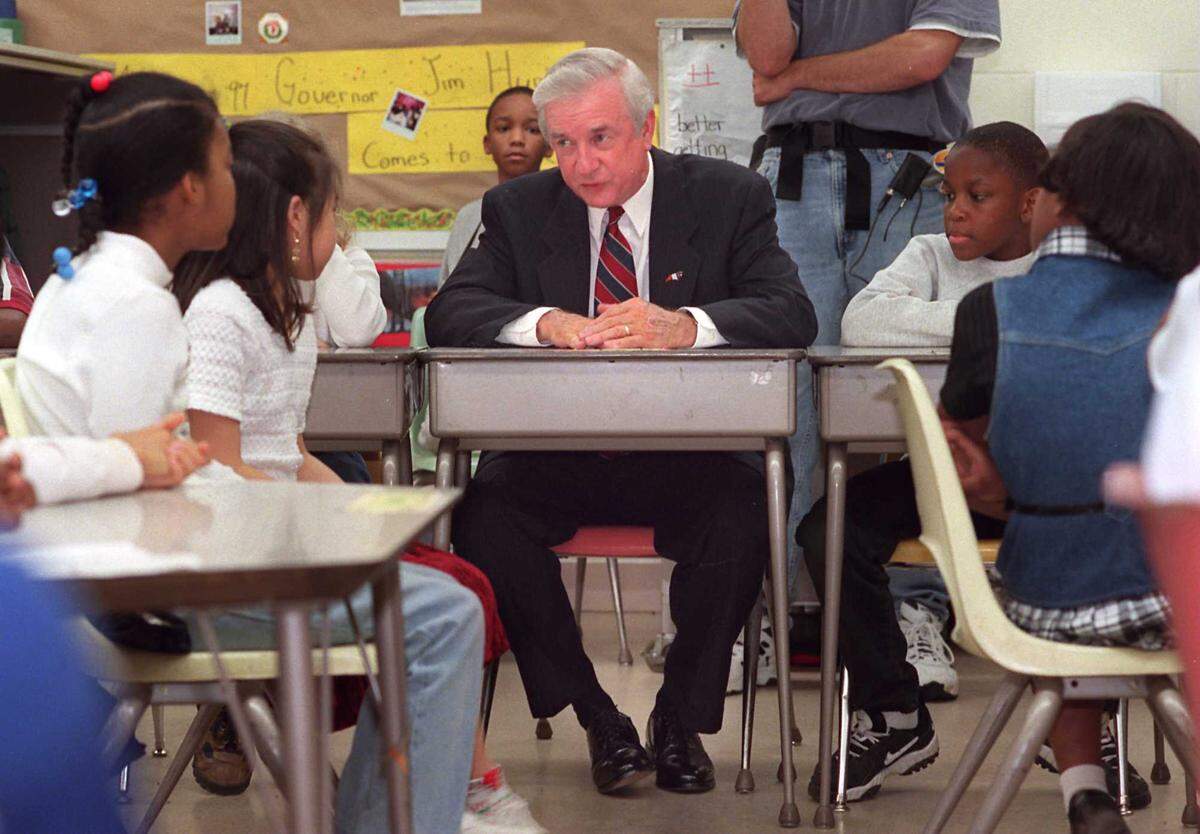 Fourth-graders at Oaklawn Elementary got to talk to Gov. Jim Hunt in 1997. Teacher Linda Taylor's class selected pupils to read stories for him as he took a seat at an empty desk. Hunt was in Charlottepromoting his "Excellent Schools Act."  