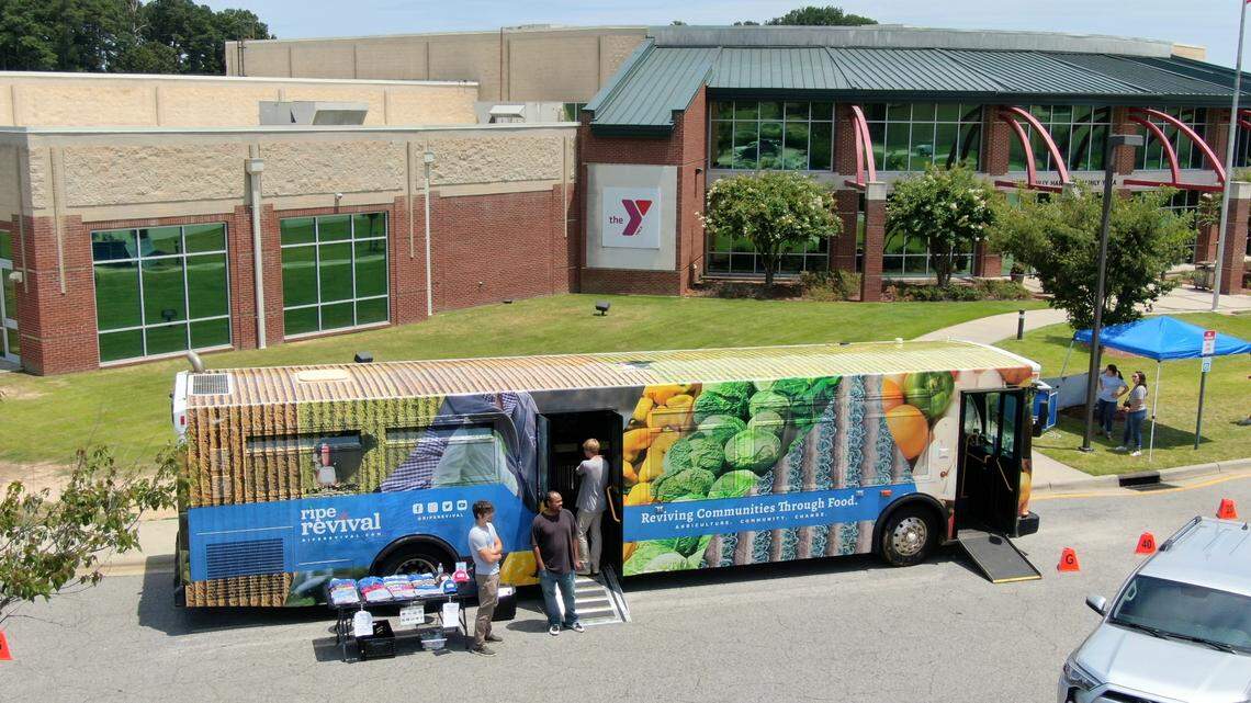 Local nonprofit Ripe for Revival’s Mobile Market is a pay-what-you-can grocery store. Formerly a transit bus, the Mobile Market drives into food deserts in North Carolina to provide farm-fresh produce.