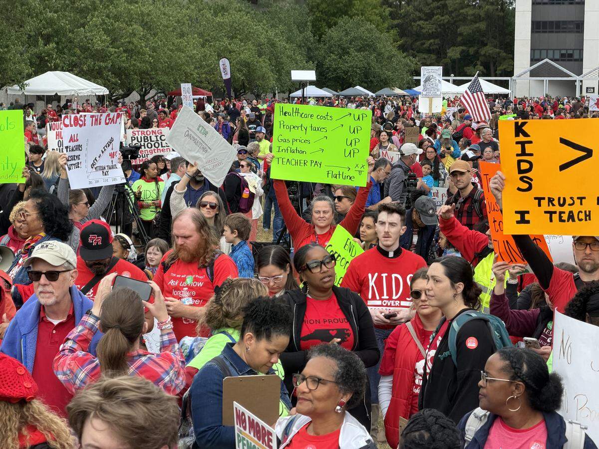 Protesters gather on Halifax Mall for the May Day teacher’s march and protest in Raleigh, Friday, May 1, 2026.